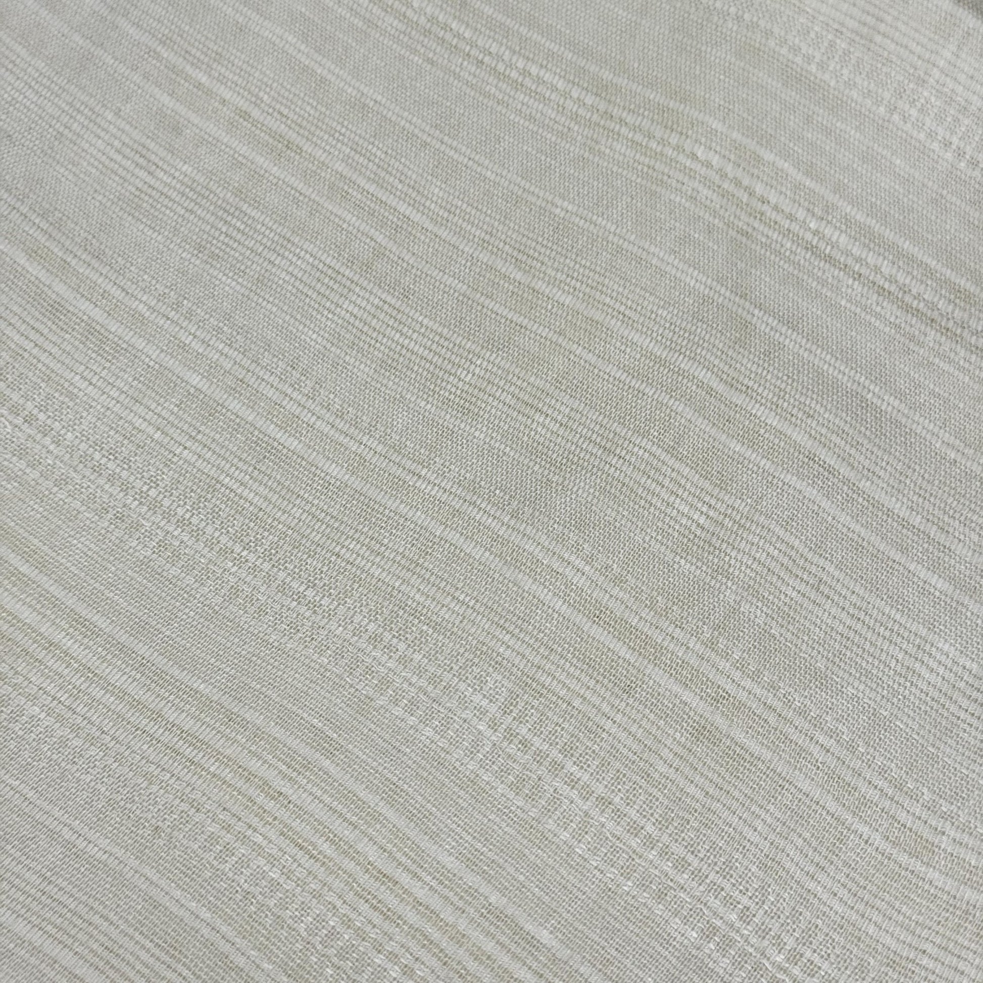 Close-up of the delicate texture of a lightweight Solid White Thai silk scarf, showcasing its elegant simplicity.