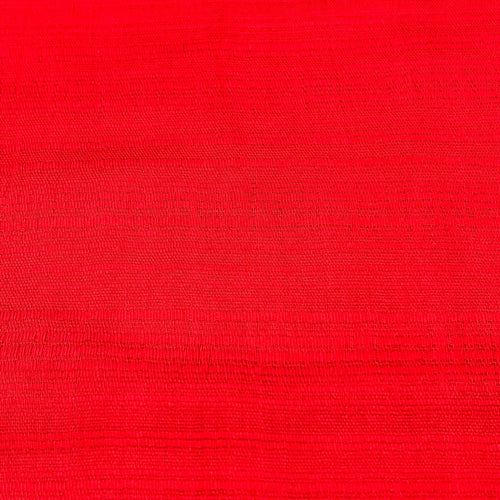 Solid red Thai silk scarf fabric, showcasing its rich texture and vibrant color for elegant accessorizing.